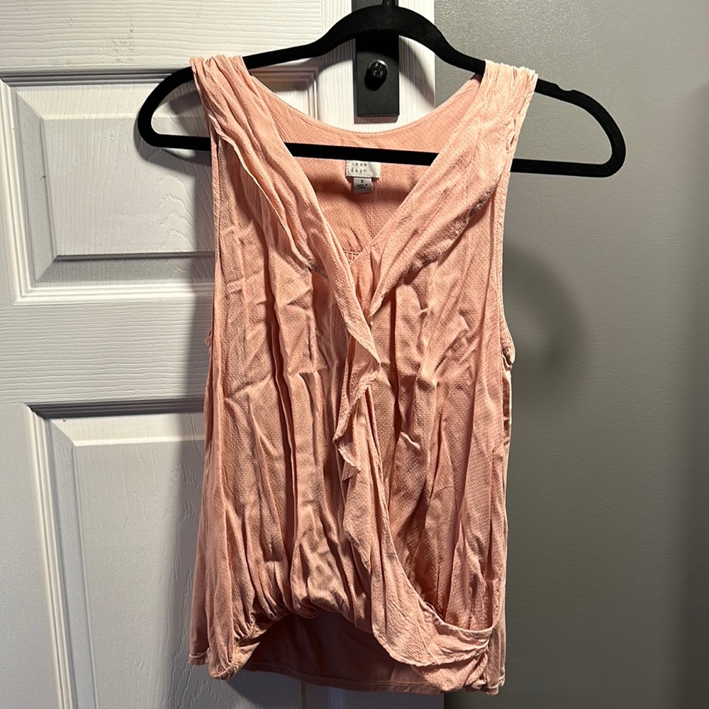 Light pink / blush colored causal top . No flaws .